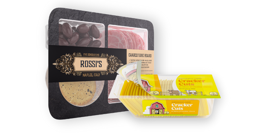 Sliced cheese and a cheese and meat tray with lidding film