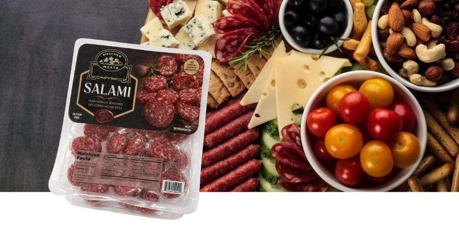 resealable lidding film packaging of salami and charcuterie board in background