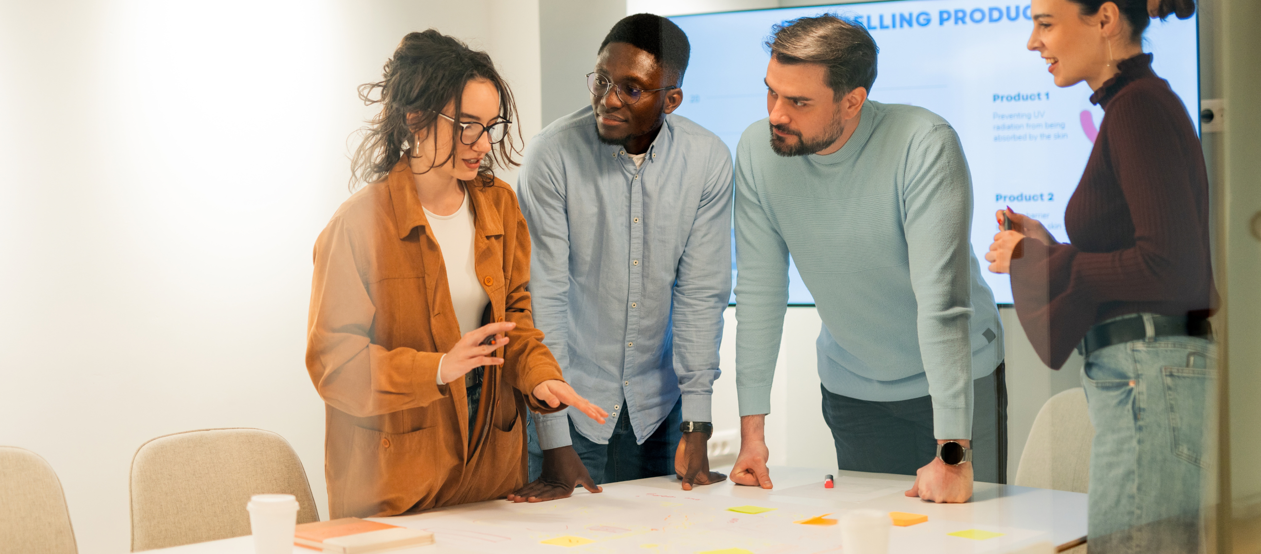 marketing team collaborating around a table